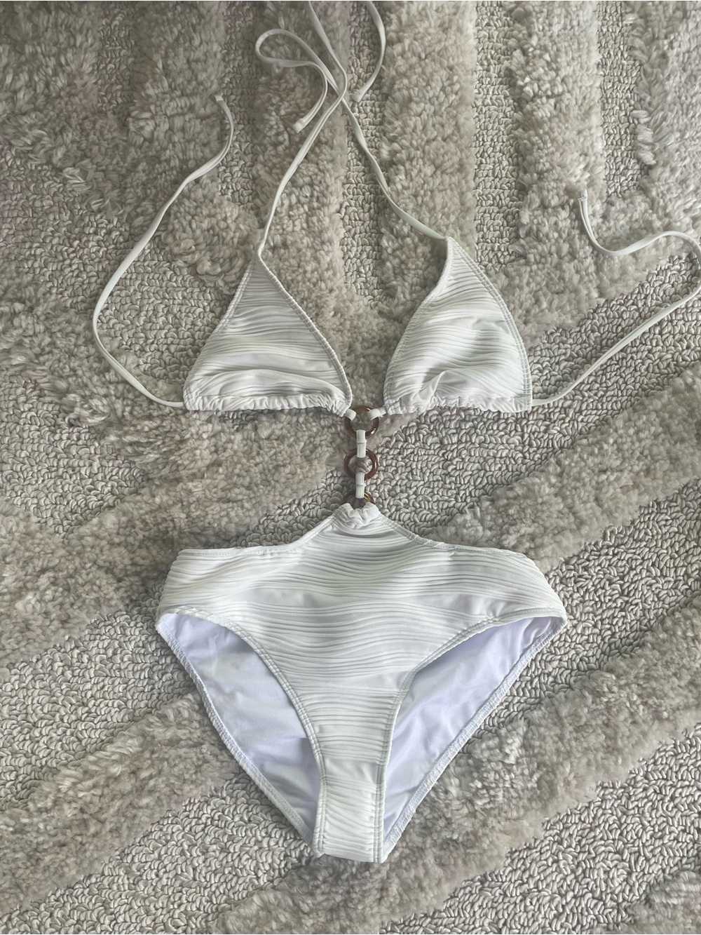 White Womans One-Piece Swimsuit with Ring Detail